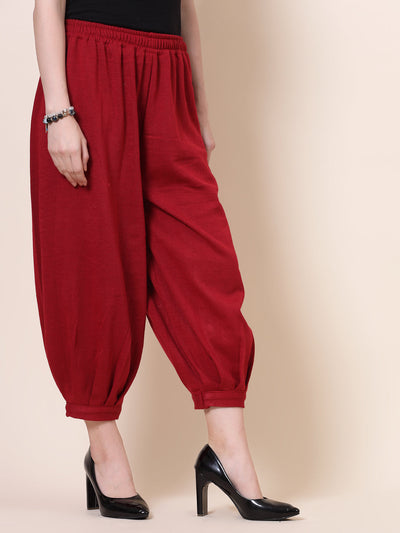 Maroon Solid Woolen Afghani Salwar with elasticated waistband.