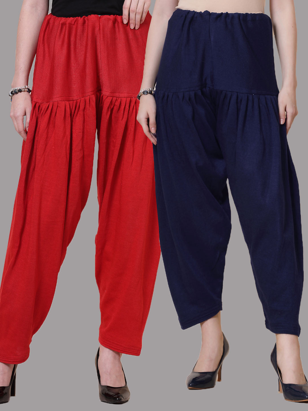 Red and navy blue solid woolen salwar pack of 2 with loose-fit semi Patiala style and drawstring closure.