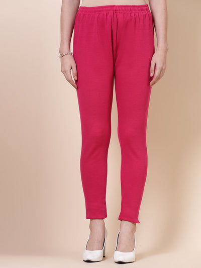 White and magenta solid woolen leggings with elastic waistband and drawstring closure.