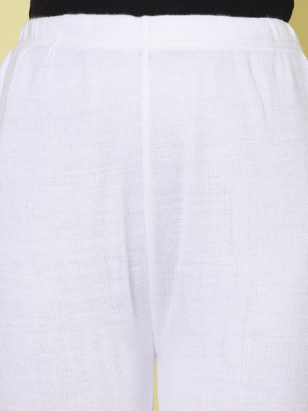 White woolen palazzo pants with elasticated waistband and slip-on closure.