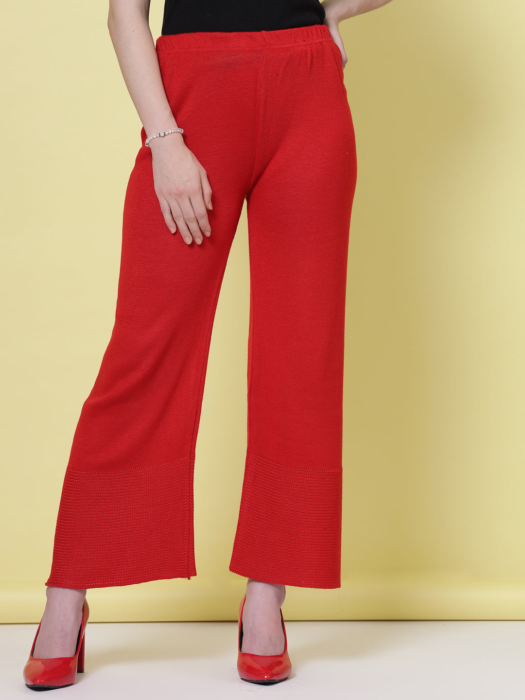 Red and light grey woolen palazzo pants with elastic waistband.