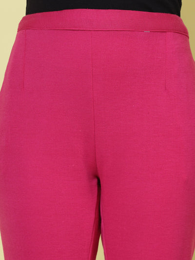 White and magenta solid woolen trousers with elasticated waistband and side pockets.