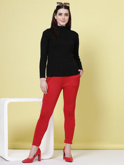 Red and magenta solid woolen trousers with elasticated waistband and side pockets.