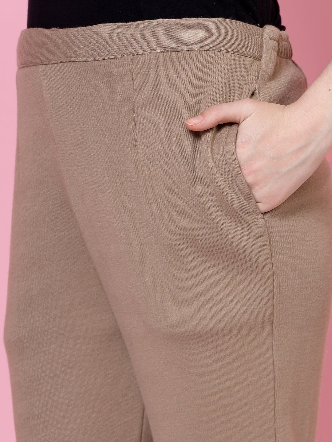 Red and dark fawn solid woolen trouser with elasticated waistband and side pockets.