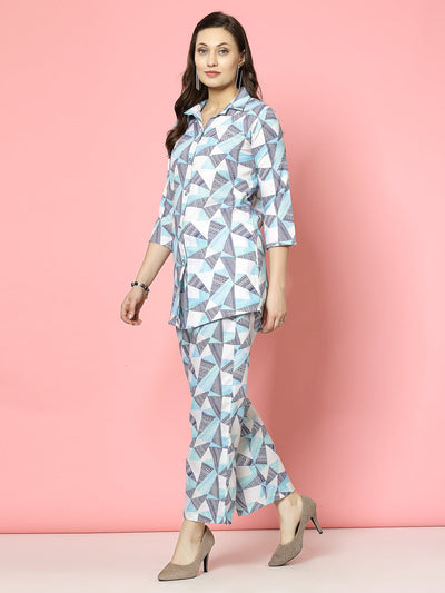 Printed shirt with trouser co-ords set featuring geometric pattern, three-quarter sleeves, shirt collar, and button closure.