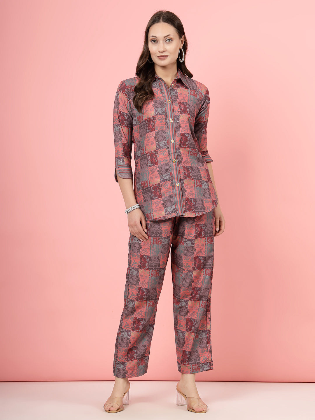 Peach floral printed shirt with trousers, featuring three-quarter sleeves and straight fit trousers.