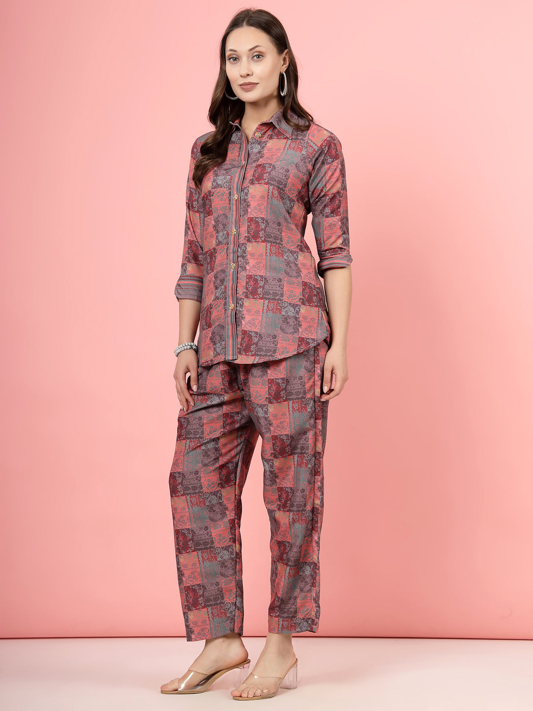 Peach floral printed shirt and trousers co-ords with three-quarter sleeves and elastic waistband.