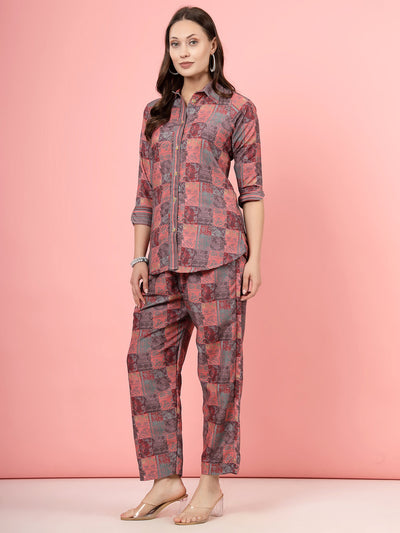 Peach floral printed shirt and trousers co-ords with three-quarter sleeves and elastic waistband.