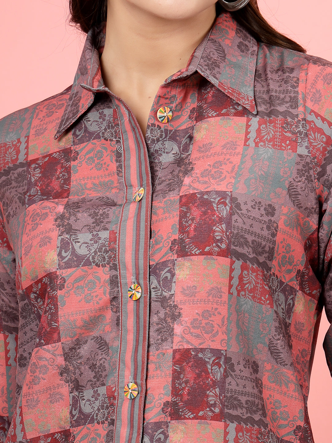 Peach and grey floral printed shirt with three-quarter sleeves and shirt collar.