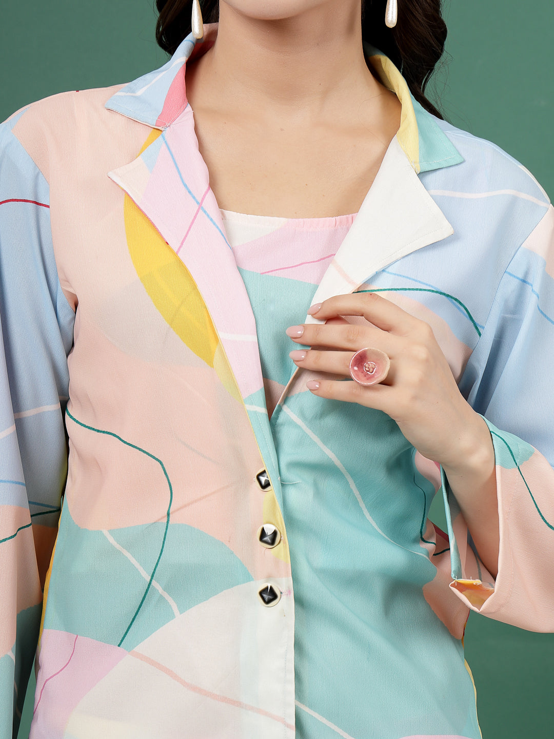 Sky blue abstract printed three-piece blazer co-ord set with notched lapel collar.