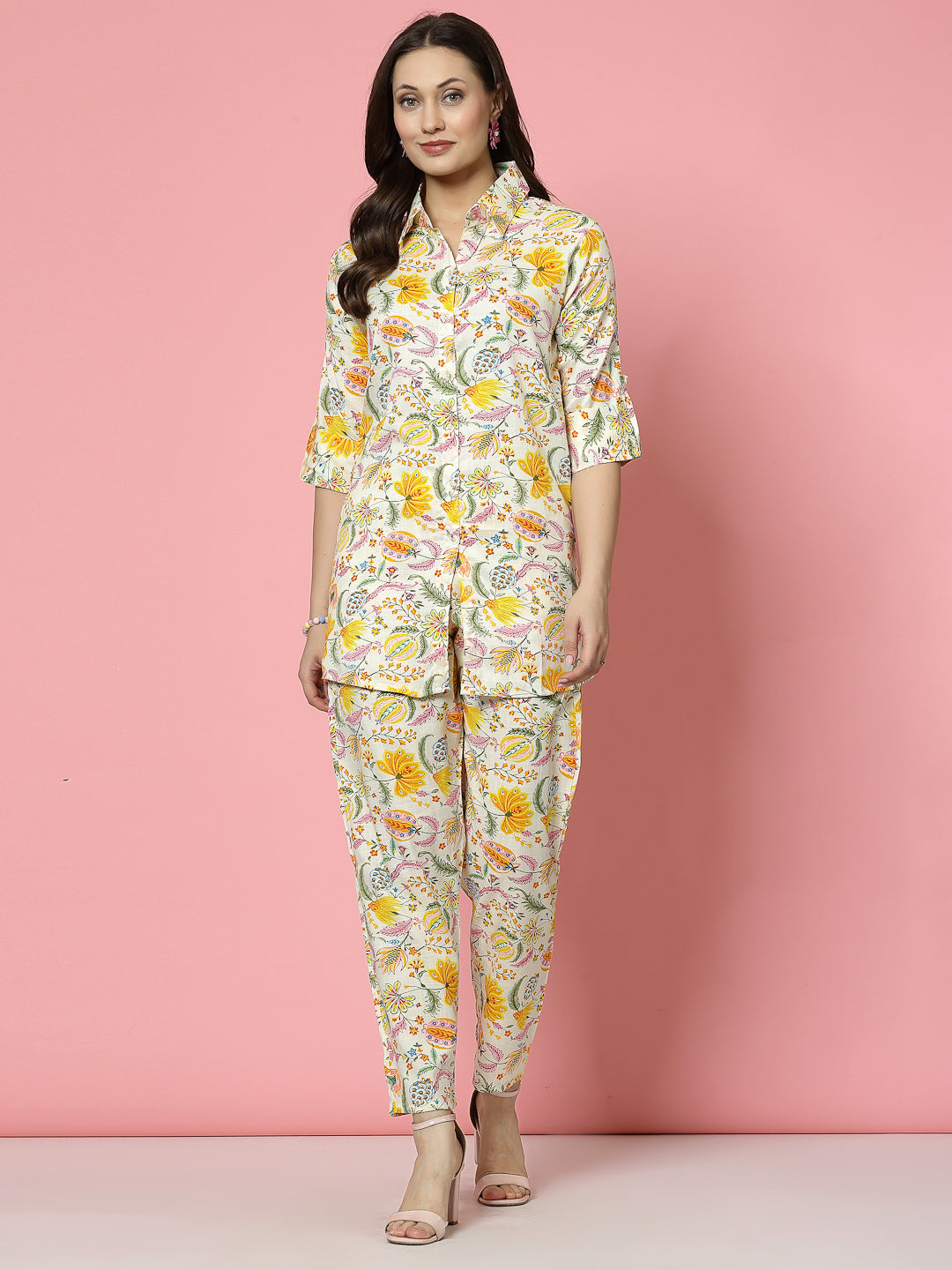 Yellow and off-white floral printed shirt and trousers co-ords with roll-up sleeves and elasticated waistband.