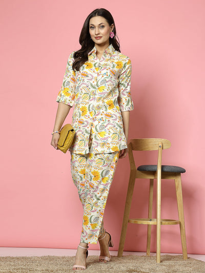 Yellow and off-white floral printed shirt and trousers co-ord set with roll-up sleeves and elasticated waistband.