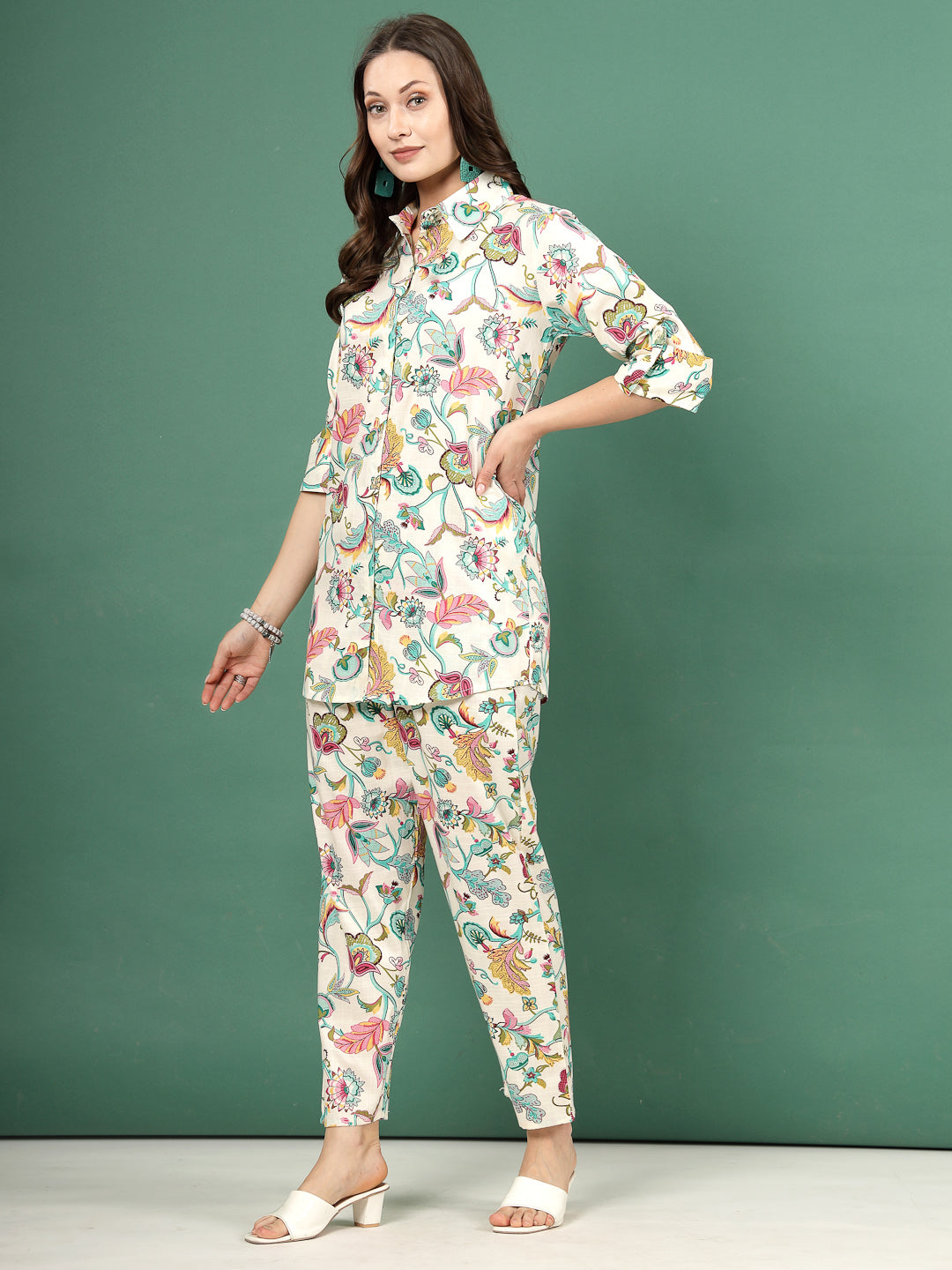 Multi printed shirt with floral design and matching trousers set.