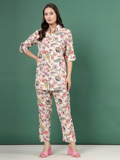 Multi printed shirt and trouser co-ords with floral design, featuring roll-up sleeves and elasticated waistband.