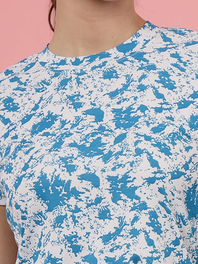 Sky blue abstract printed top with round neck and cap sleeves.