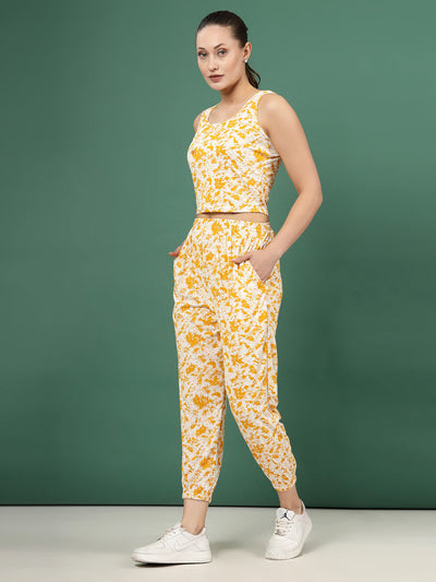 Printed sleeveless top with mustard abstract design and joggers co-ords set.