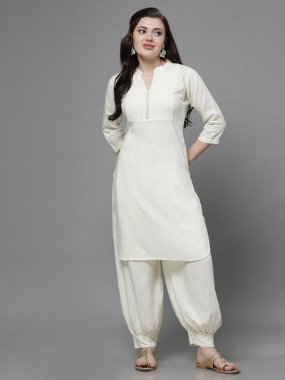 Yoke design kurta with Afghani pants in off-white, featuring three-quarter sleeves and mandarin collar.