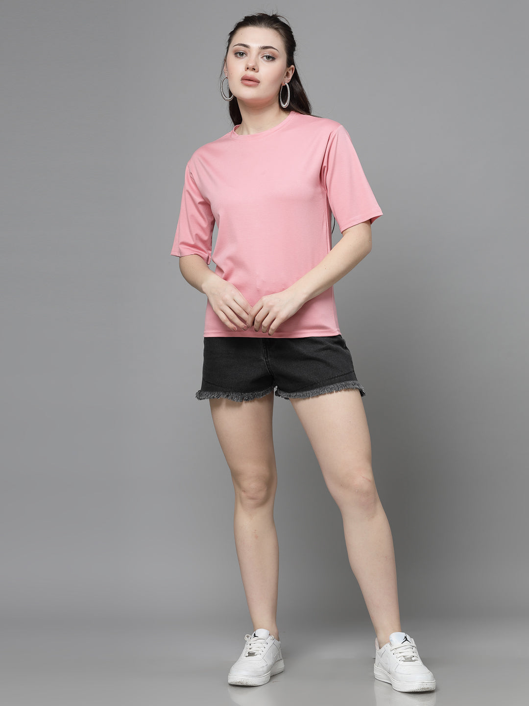 Pink solid regular fit Tencel women's t-shirt with short sleeves and round neck.