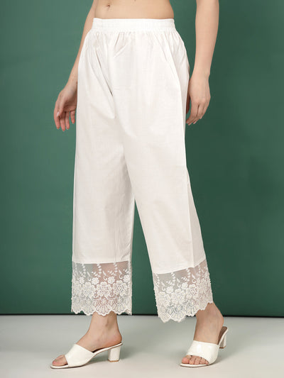 Off-White Palazzo Pants with Lace Accent, featuring wide-legged silhouette and organza lace hemline.