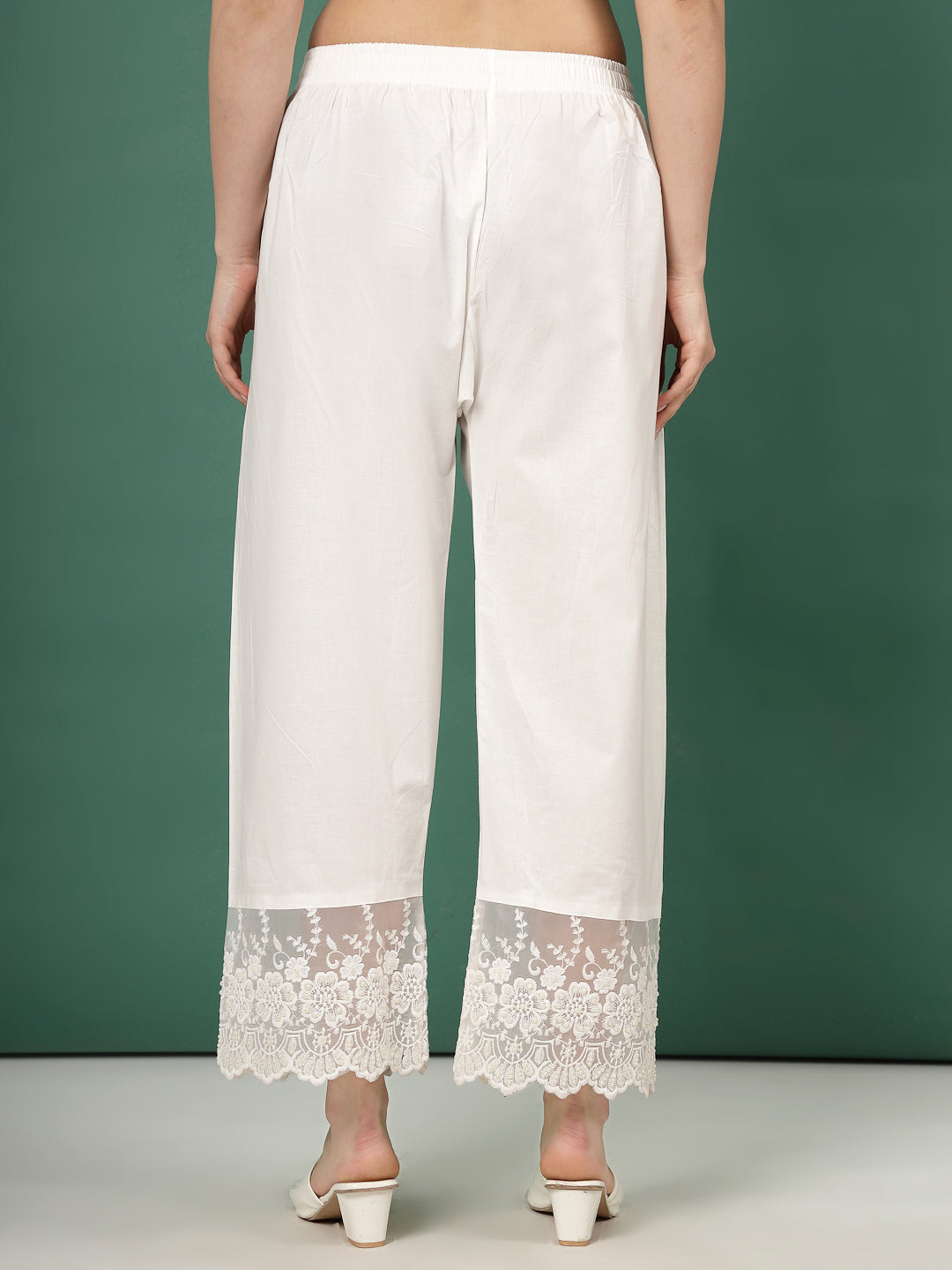 Off-White Palazzo Pants with Organza Lace Border, wide-legged silhouette.