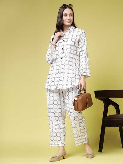 White embroidered shirt with trousers co-ords featuring three-quarter sleeves and elasticated waistband.