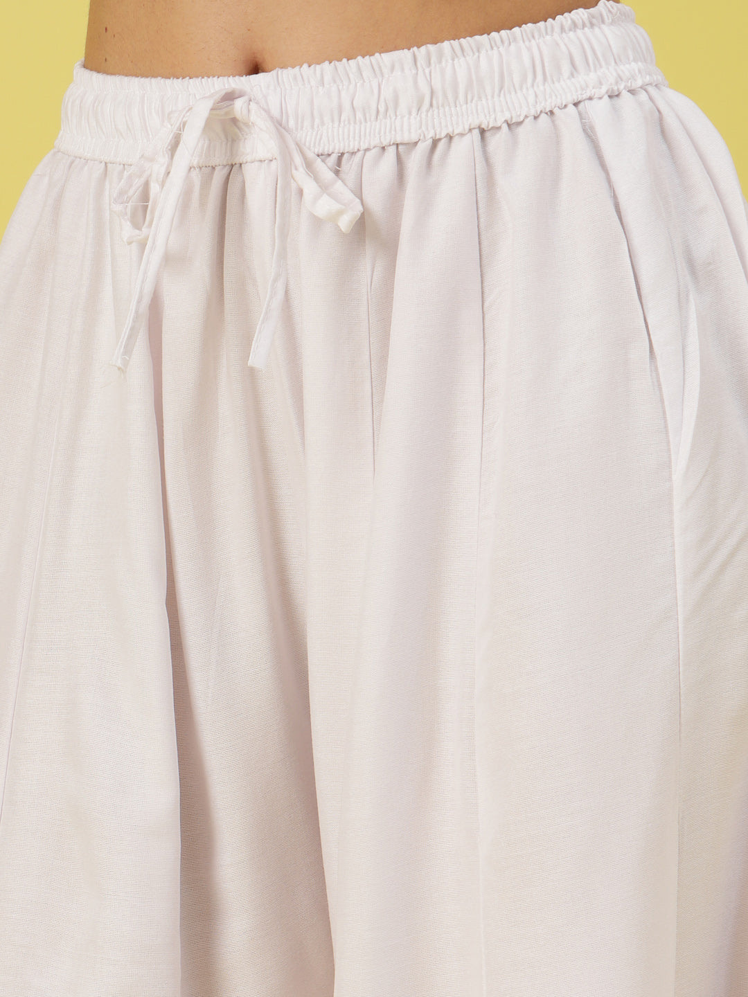 Women Solid White Flared Rayon Sharara with Elasticated Waistband and Drawstring.