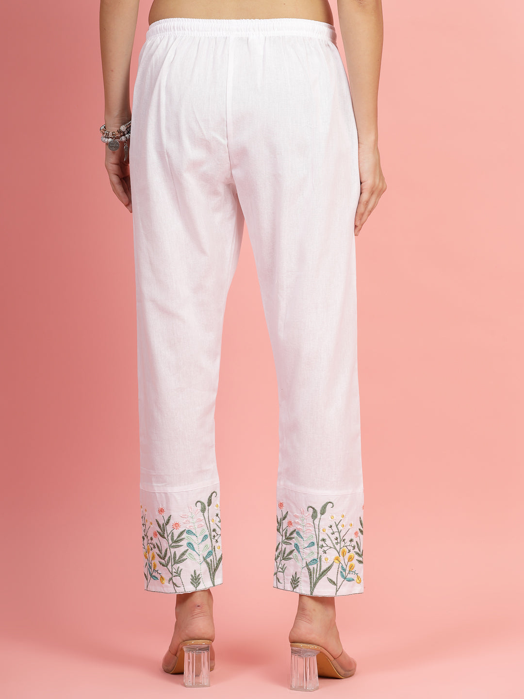 Women’s embroidered hem design mid rise pants, regular fit, flat-front, two pockets.