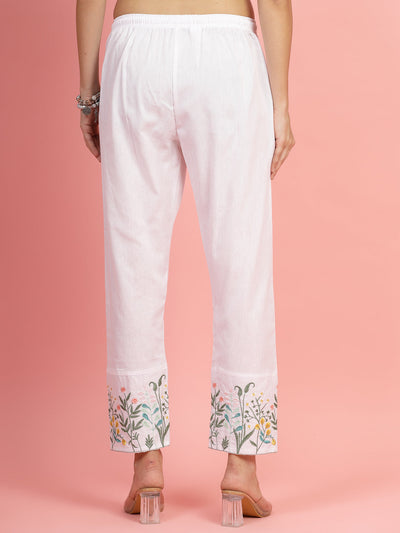 Women’s embroidered hem design mid rise pants, regular fit, flat-front, two pockets.