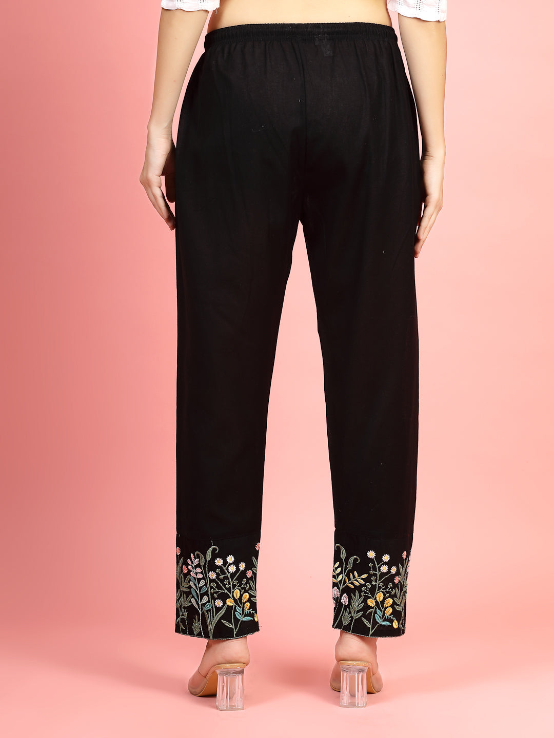 Women mid-rise pants with embroidered hem design, regular fit, flat-front, featuring two pockets.