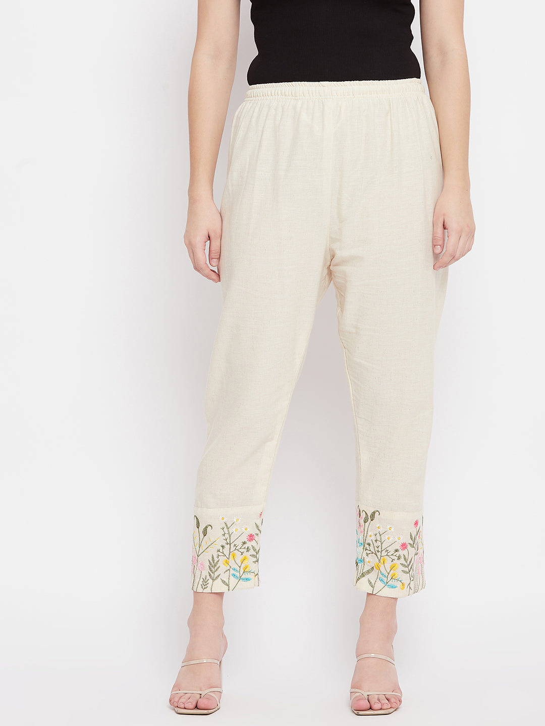 Women embroidered hem design mid-rise pants with regular fit and two pockets.