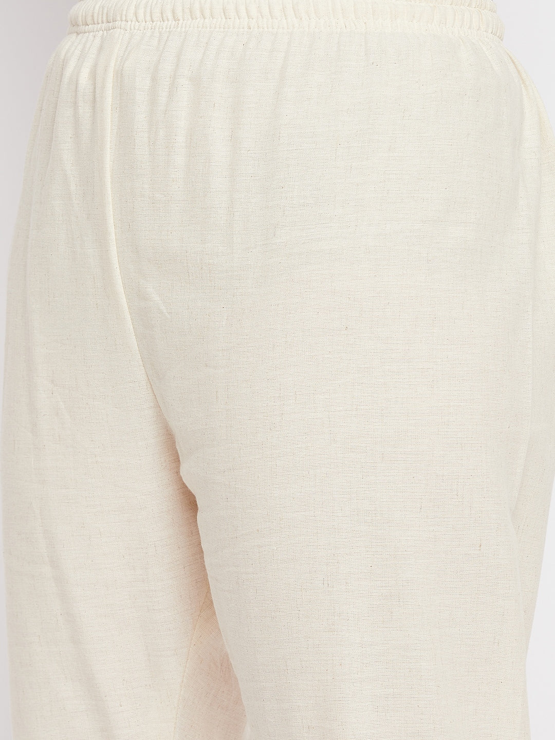 Women embroidered hem design mid rise pants in a regular fit, featuring flat-front style with two pockets.