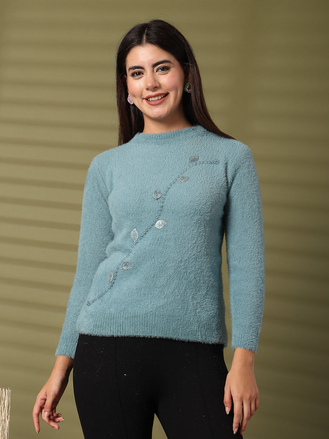 Sea green embellished woolen top with full sleeves, featuring delicate decorations for an elegant winter look.