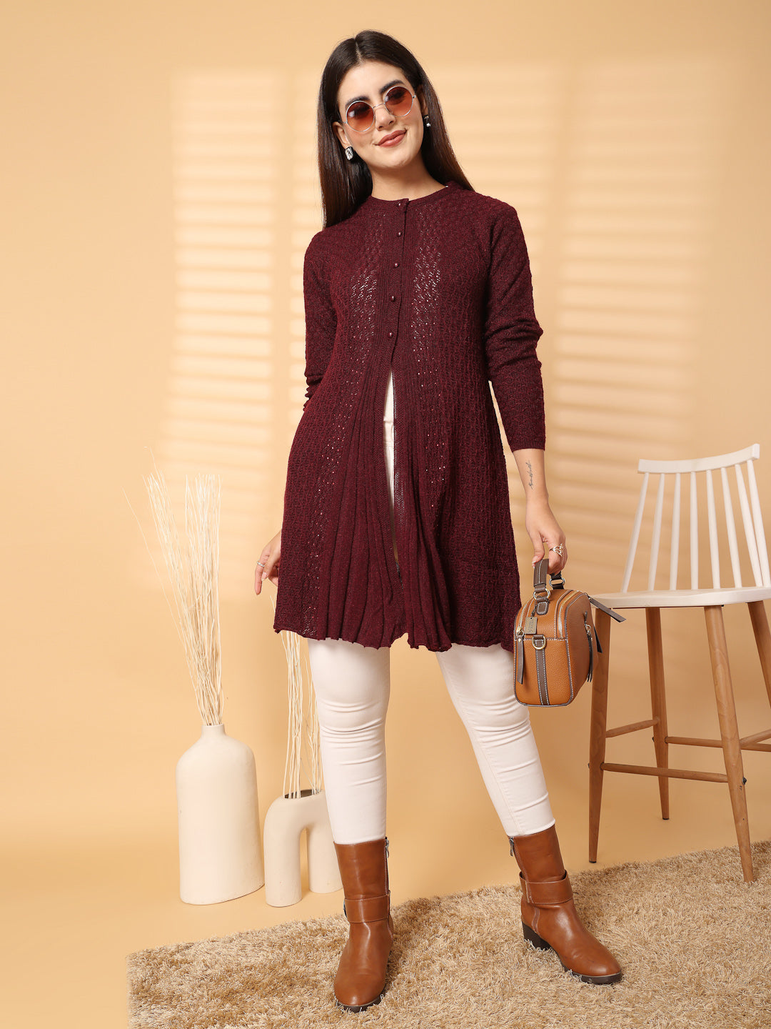 Wine embellished longline woolen cardigan with full sleeves and stylish embellishments.