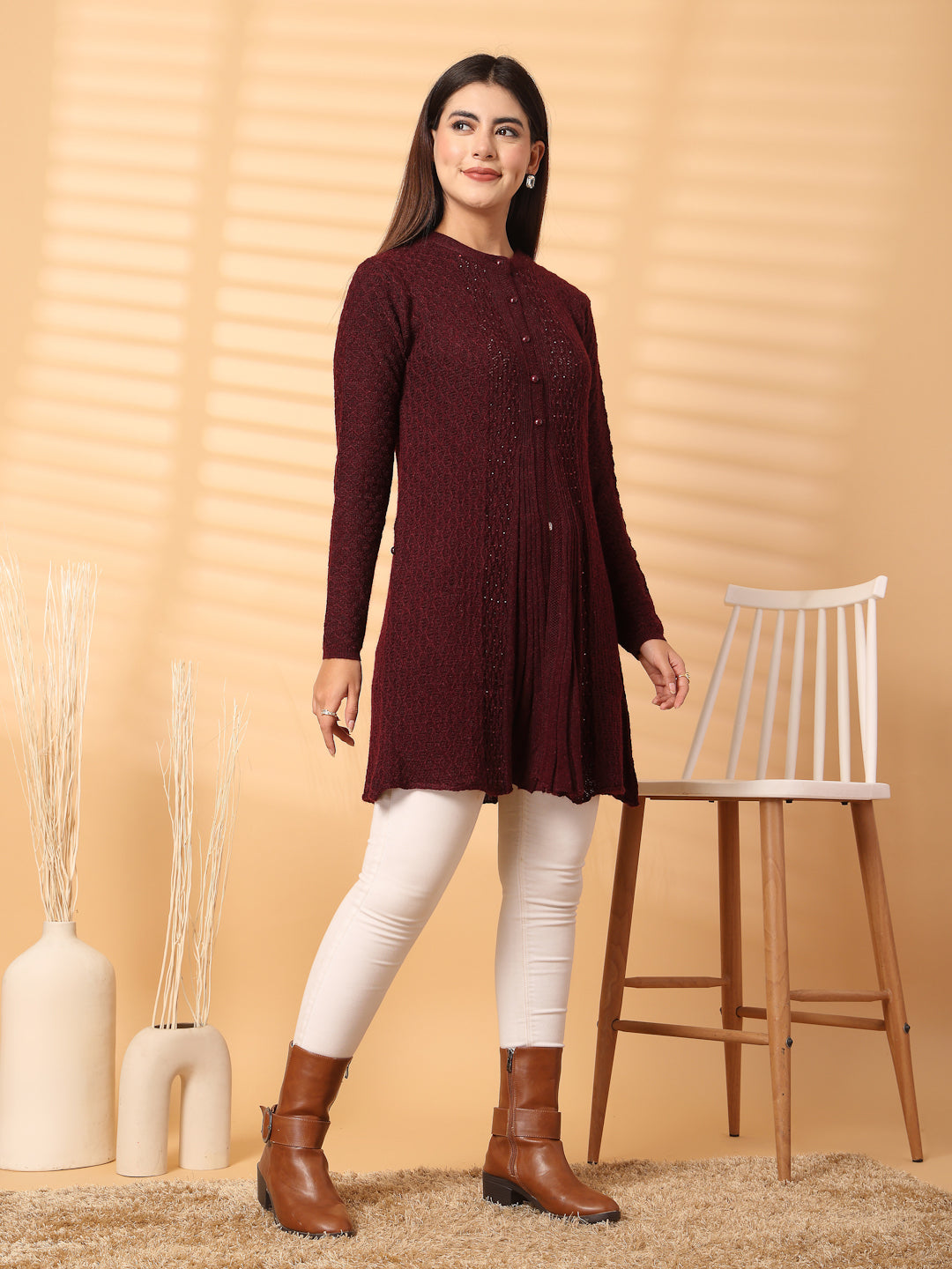 Wine embellished longline woolen cardigan on model, full sleeves, elegant and warm design.