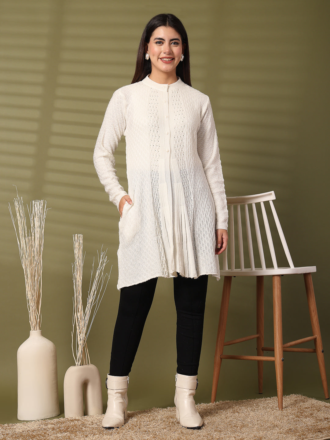 White embellished longline woolen cardigan perfect for winter elegance.