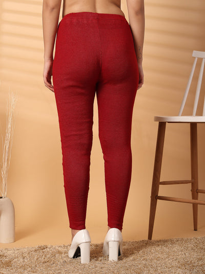 Women maroon solid woolen leggings with unique hem design for warmth and style.