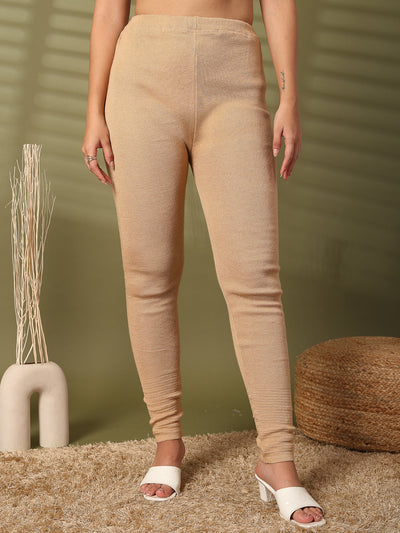 Women fawn solid woolen leggings with unique hem design for warmth and style.