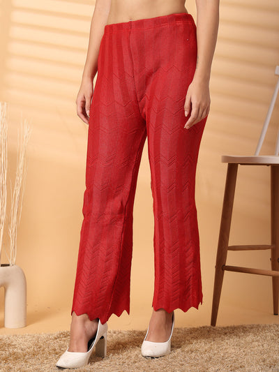 Red solid cut work woolen palazzo with intricate hem detailing.