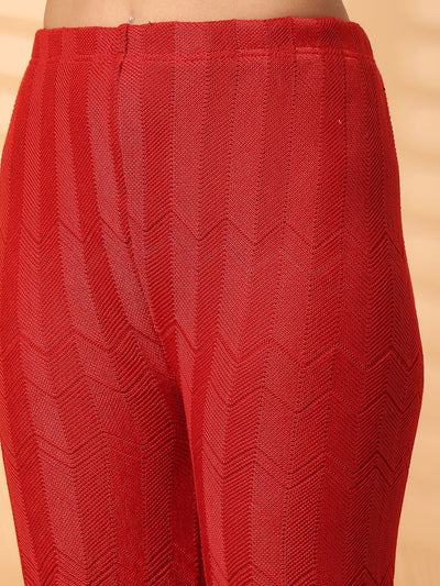 Red solid cut work woolen palazzo with intricate hem detailing.