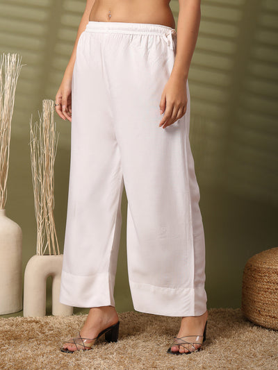 White solid rayon straight palazzo with wide leg fit and elastic waistband.