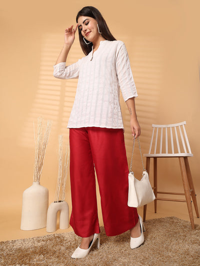 Red solid rayon straight palazzo with wide leg fit and elasticated waistband.