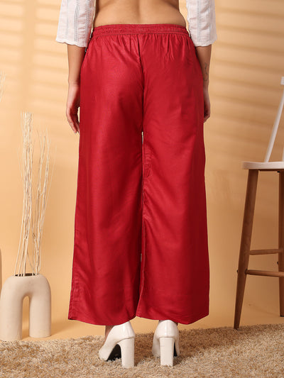 Red solid rayon straight palazzo with wide leg fit and elasticated waistband.