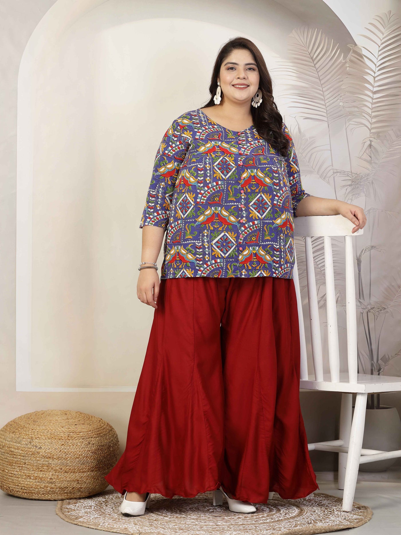 Plus size women’s solid maroon flared rayon sharara with elasticated waistband and drawstring closure.