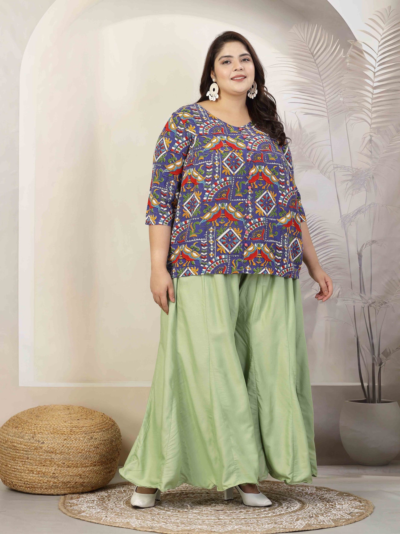 Plus size pista green flared rayon sharara with elasticated waistband and drawstring.