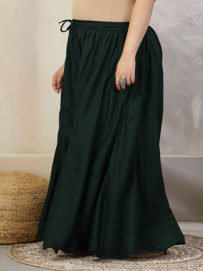 Women solid bottle green flared rayon sharara with elasticated waistband.