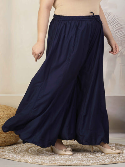 Women solid navy blue flared rayon sharara with elasticated waistband.