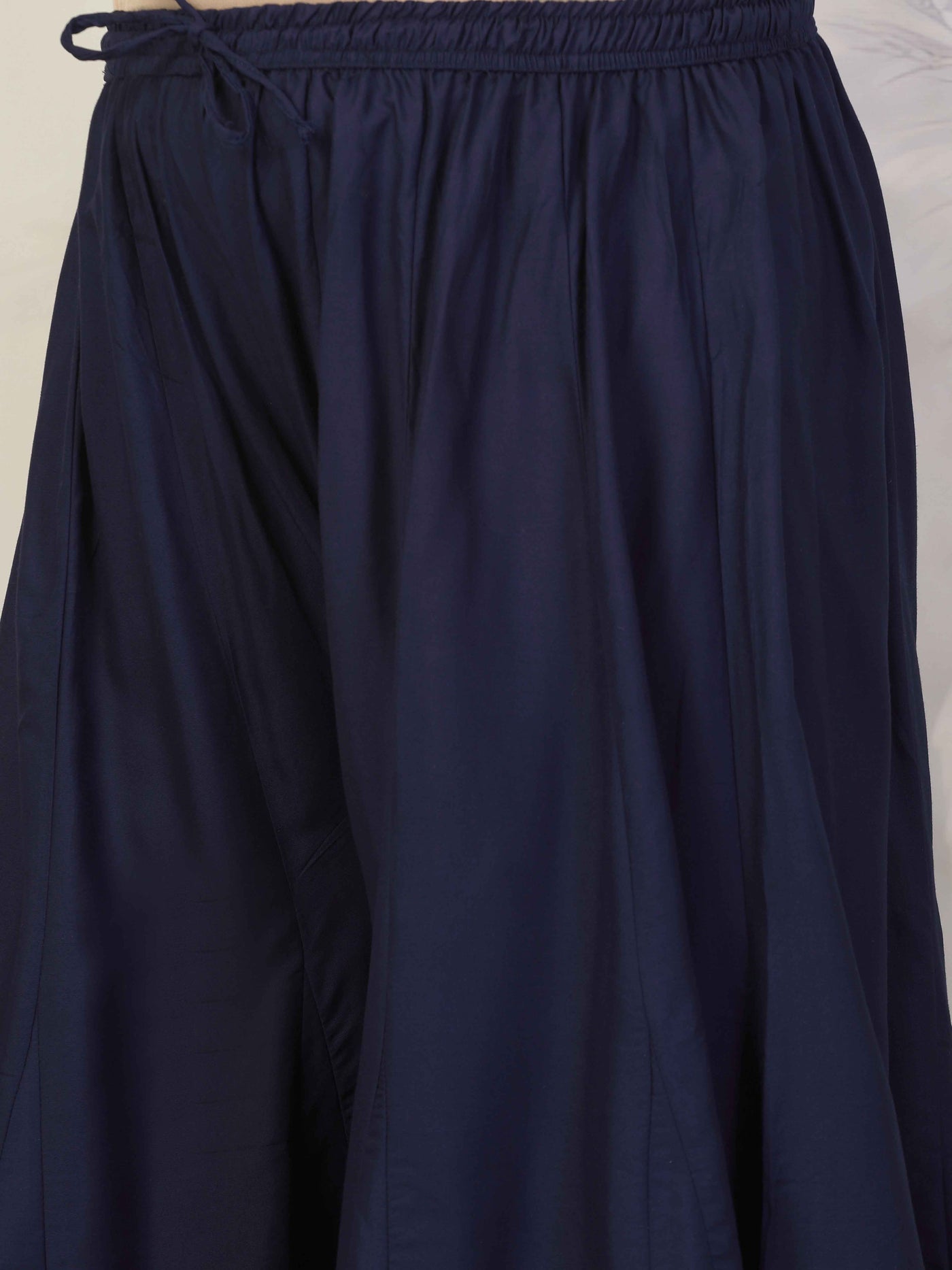 Women solid navy blue flared rayon sharara with elasticated waistband.