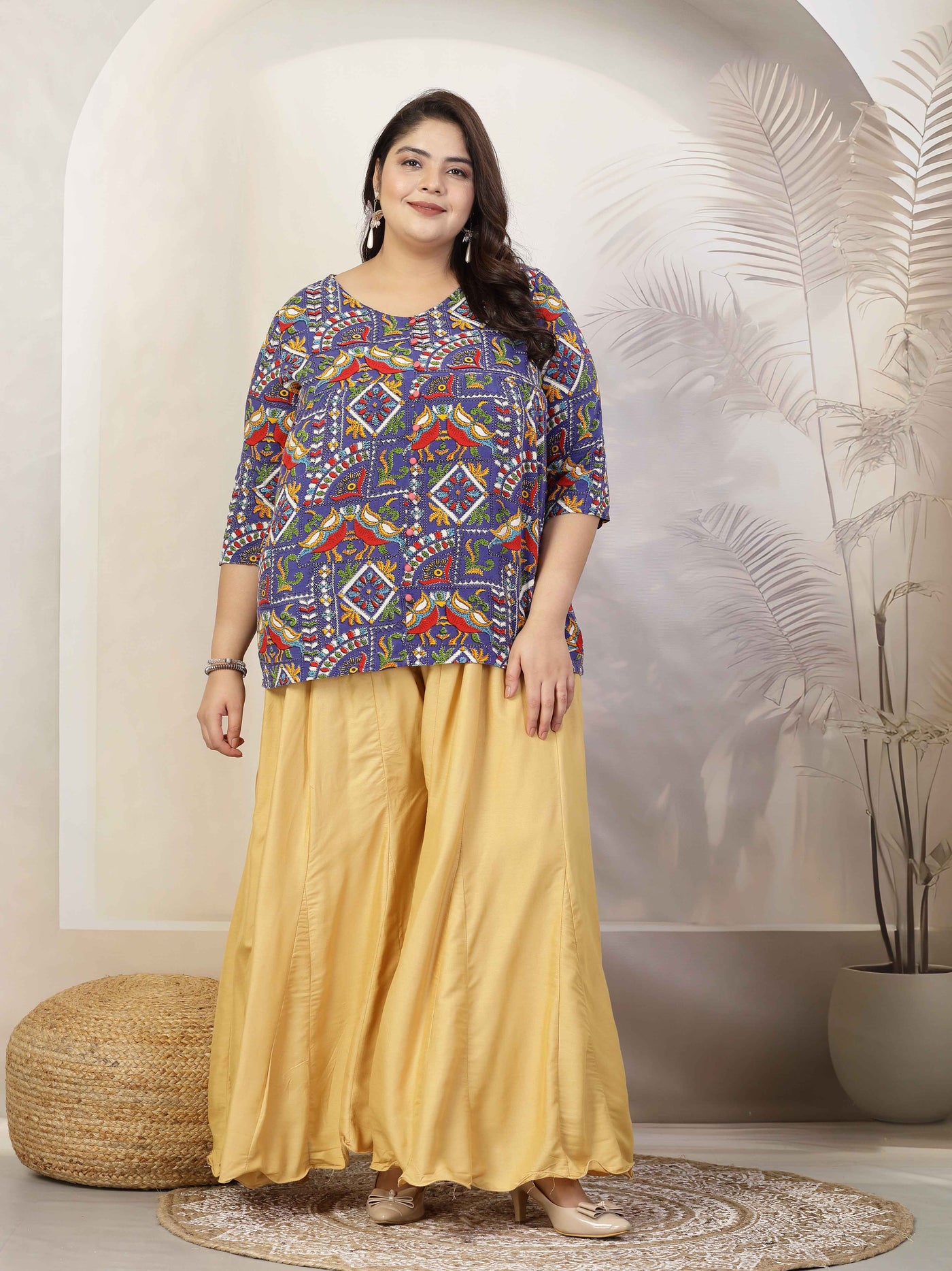 Plus size women solid fawn flared rayon sharara with elasticated waistband and drawstring closure.