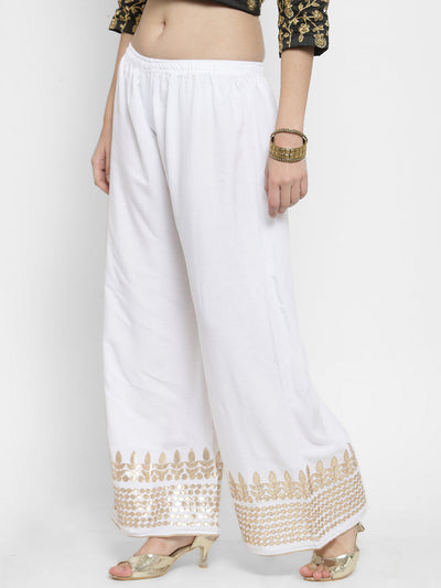 White Gotta Patti Rayon Palazzo with elastic waistband and gold hem detailing.