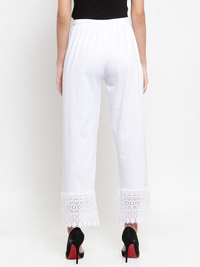 White viscose lace palazzo pants with elegant design.